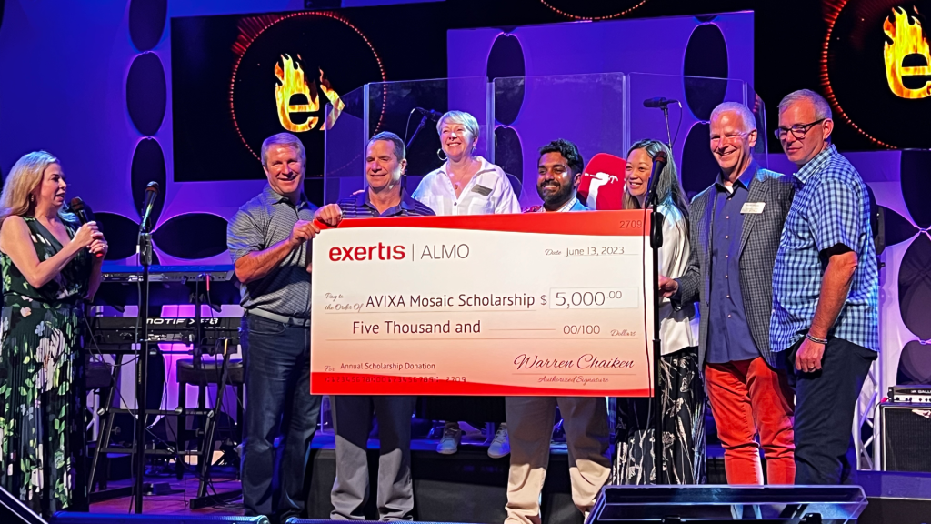 members of Exertis Almo donate $5,000 check to AVIXA Mosaic Scholarship